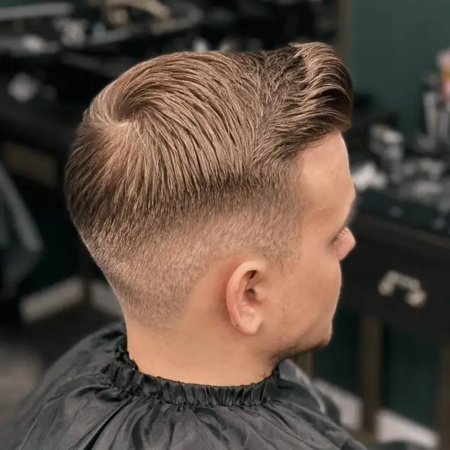 Blond fade back view w Boske Barber Rzeszów